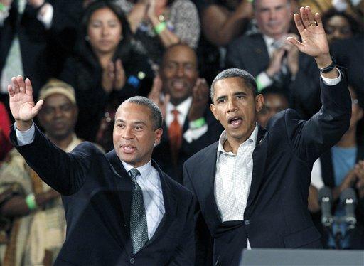 President Barack Obama and Gov. Deval Patrick wave to the crowd during a rally for Patrick in Boston, Saturday, Oct. 16, 2010. (AP)