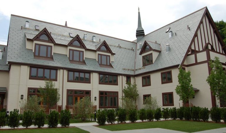 The St. Aidan's development is a former Brookline church that has been converted into 59-units of mixed income housing, 36 of which are designated as permanently affordable. (Courtesy of MassHousing)