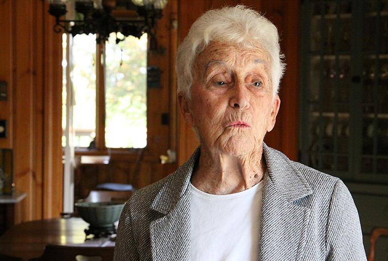 Alba Thompson, 92, an independent voter, was born and raised in Plymouth. She served under General Douglas MacArthur in Japan and then South Korea. In 1985, the retired teacher was elected Plymouth&#039;s first selectwoman. (Kirk Carapezza for WBUR)
