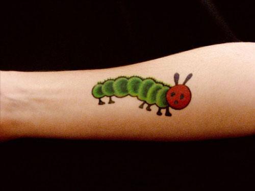 Becky Quiroga with an image inspired by the children&#039;s book &quot;The Very Hungry Caterpillar&quot; by Eric Carle (from &quot;The Word Made Flesh&quot;).