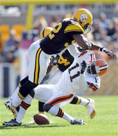 Pittsburgh Steelers linebacker James Harrison (92) payed a $75,000 fine for this hit on Cleveland Browns wide receiver Mohamed Massaquoi (11) shown in this AP file photo from Oct. 17, 2010. (AP Photo/Don Wright, File) 