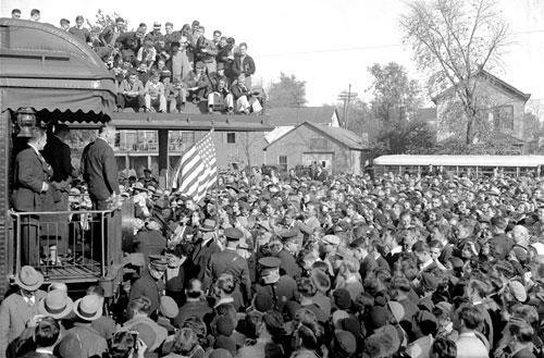 U.S. President Herbert Hoover campaigns for re-election from the rear of the presidential train in 1932. (AP)