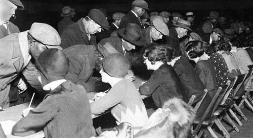 Some of the 11,000 jobless in Cleveland register for temporary work, Nov. 13, 1930, during the Great Depression. (AP)
