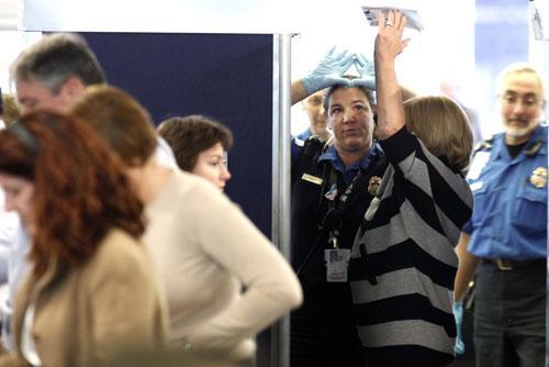 An airline passenger undergoes a full body scan at O&#039;Hare International Airport, Nov. 17, 2010 in Chicago. (AP)
