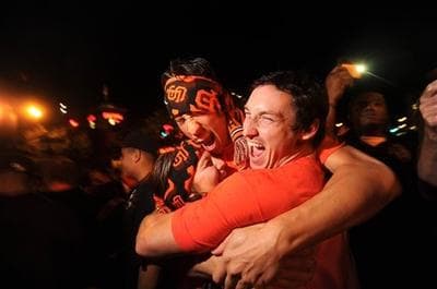 Giants fans celebrate outside the Giants stadium in San Francisco after the team clinched the World Series. (AP)