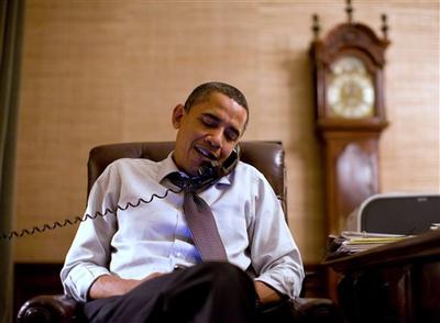 In this image released by the White House, President Barack Obama makes an election night phone call to Rep. John Boehner, R-Ohio, who will most likely be the next House Speaker, from the Treaty Room in the White House. (AP)