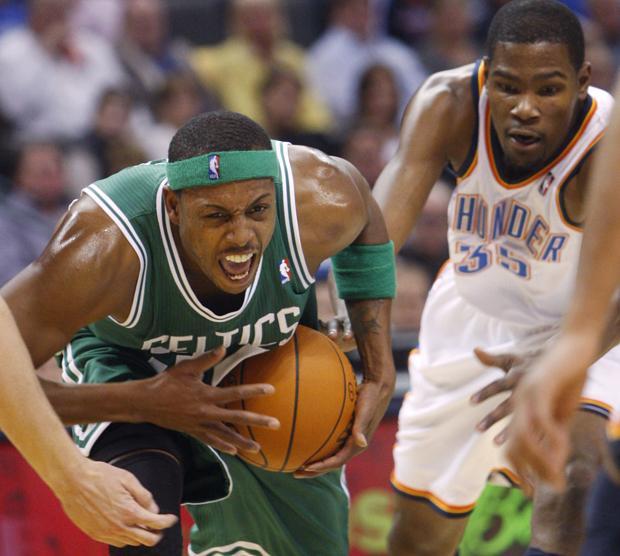 Boston forward Paul Pierce, left, drives past Oklahoma City forward Kevin Durant during the second quarter of the game in Oklahoma City on Sunday. (AP)