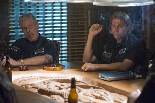 In this image released by FX channel, Ron Perlman, left, and Charlie Hunnam are shown in a scene from &quot;Sons of Anarchy&quot; on FX. (AP)