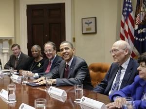 President Obama meets with members of the fiscal responsibility commission in April. (AP)
