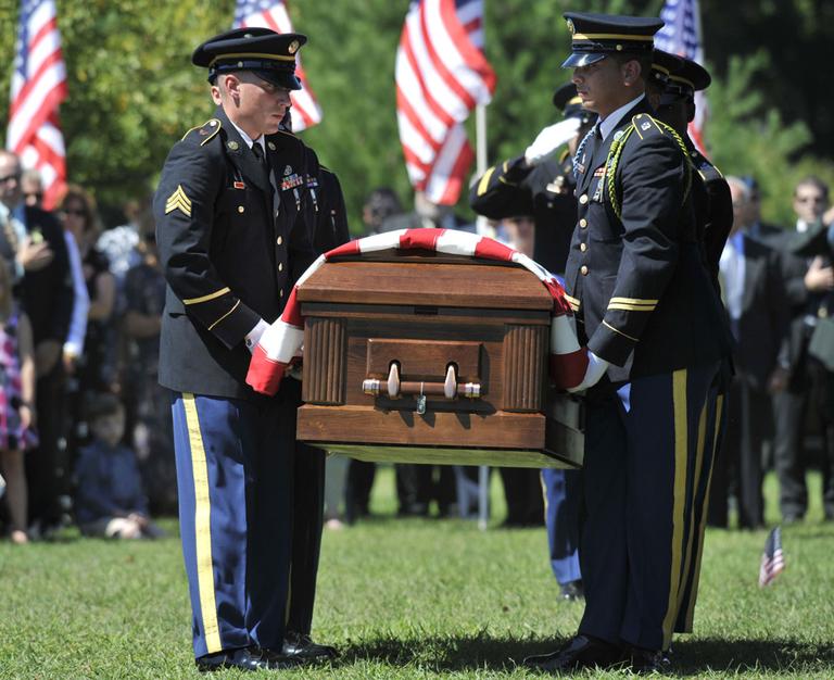 Connecticut Army National Guard Military Funeral Honors Team carry the casket of Army Sgt. Steven J. DeLuzio during funeral services in Glastonbury, Conn., Monday, Aug. 30, 2010.  (AP)