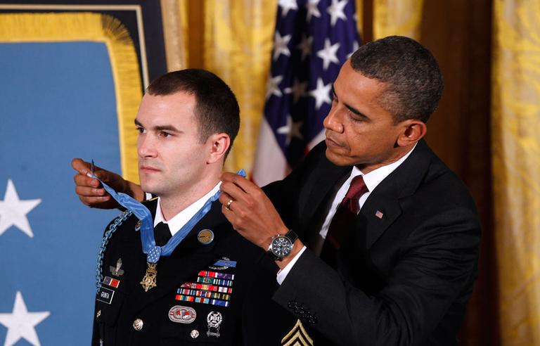 President Obama presents the Medal of Honor to Army Staff Sgt. Salvatore Giunta during a ceremony in the East Room of the White House on Tuesday. (AP)