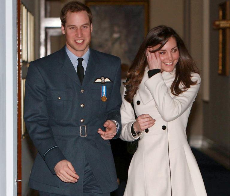 In this April 11, 2008 file photo, Britain's Prince William and his girlfriend, Kate Middleton, walk together at RAF Cranwell, England, after William received his RAF wings from his father, the Prince of Wales. (AP)