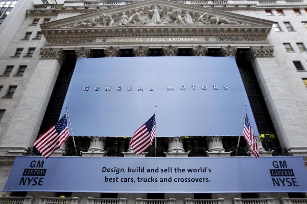 A banner displaying the name of General Motors covers the New York Stock Exchange in New York, Thursday. (AP)