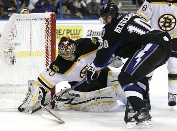 Tampa Bay left wing Sean Bergenheim (10) knocks the puck from Boston goalie Tuukka Rask, of Finland, (40) during the third period of the game on Monday in Tampa, Fla. (AP)