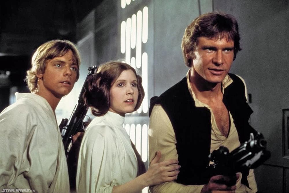 Mark Hamill, Carrie Fisher and Harrison Ford as Luke Skywaker, Princess Leia and Han Solo appear in a scene from &quot;Star Wars.&quot;  (AP)