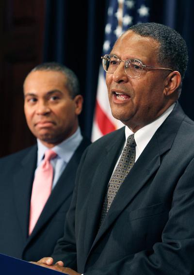 Supreme Judicial Court Associate Justice Roderick Ireland, right, faces reporters as Gov. Deval Patrick, left, looks on during a news conference on Nov. 4. (AP)