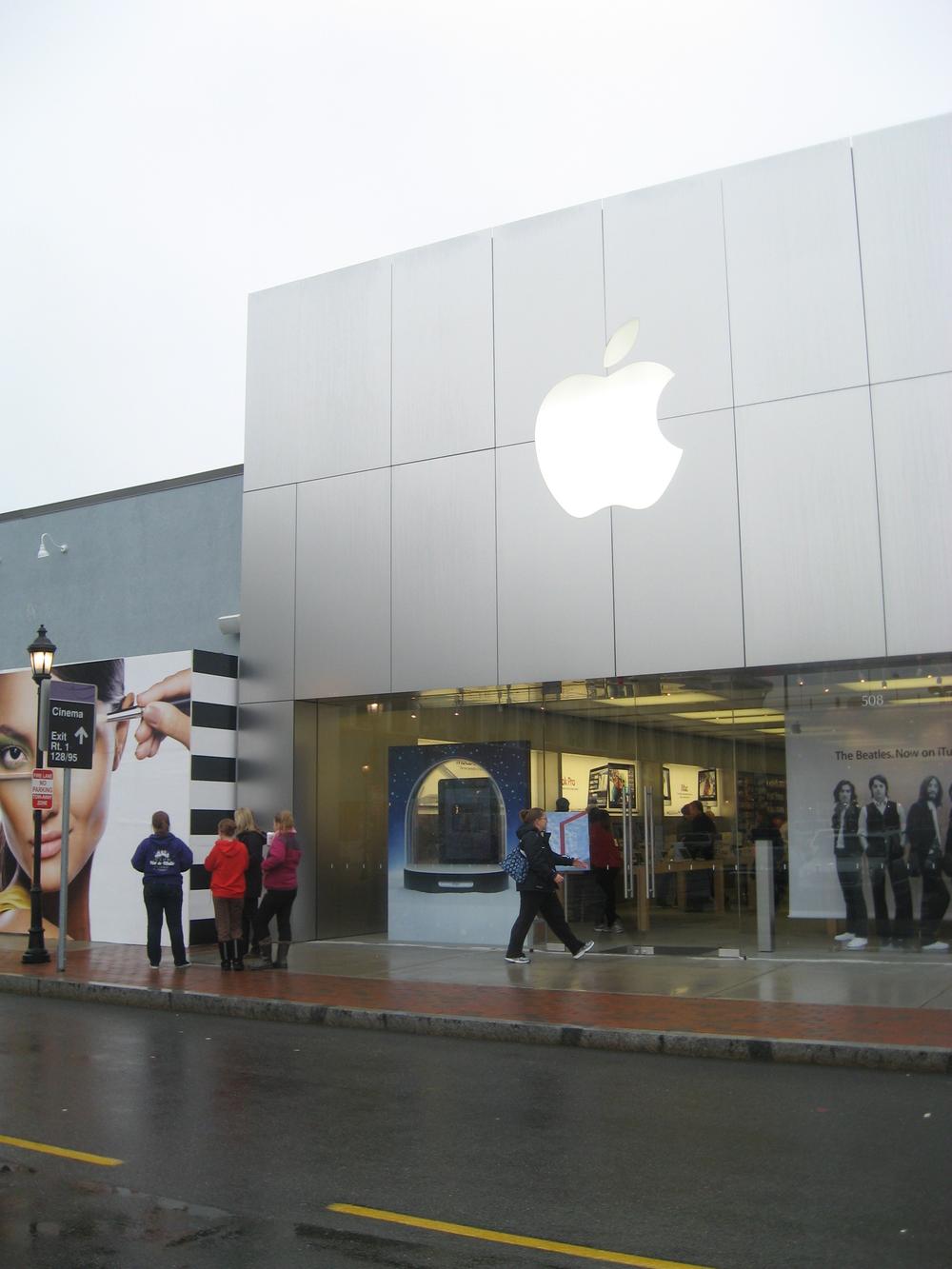 The rain limited crowds somewhat at the Apple Store at the new Dedham Mall, Legacy Place. (Curt Nickisch/WBUR)