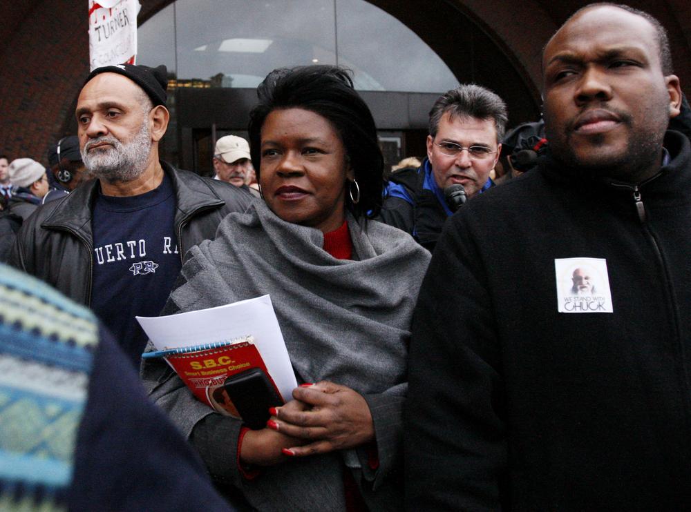 Former Massachusetts state Sen. Dianne Wilkerson, center, leaves federal court in Boston Dec. 10, 2008, where she pleaded not guilty to new charges in an ongoing corruption probe. She later pleaded guilty. (AP)