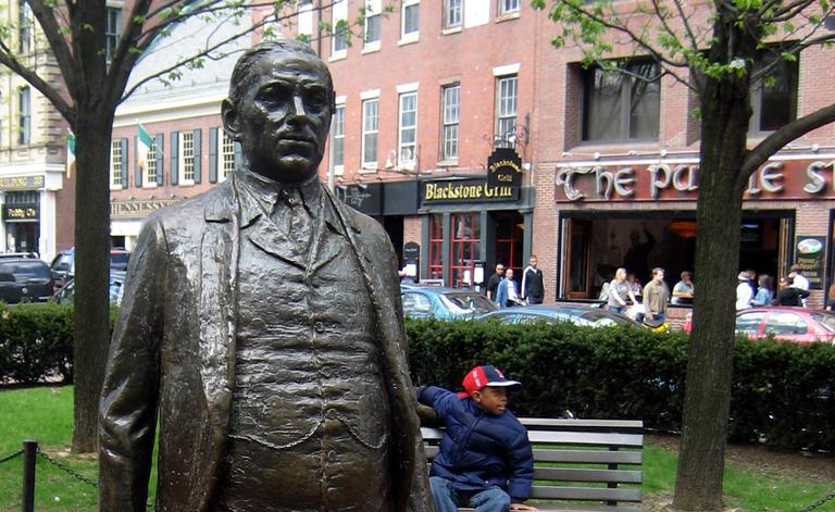 James M. Curley is honored with two statues near Faneuil Hall. (wallyg/Flickr)