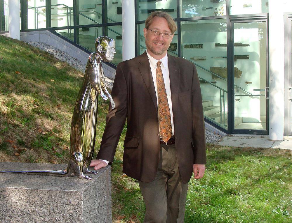 Nick Capasso stands next to Otter, a sculpture by artist Rona Pondick, in the DeCordova Sculpture Park and Museum in Lincoln. (Courtesy of DeCordova Museum)