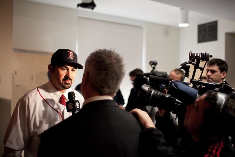 Adrian Gonzalez meets members of the Boston media. (Nicholas Dynan for WBUR)