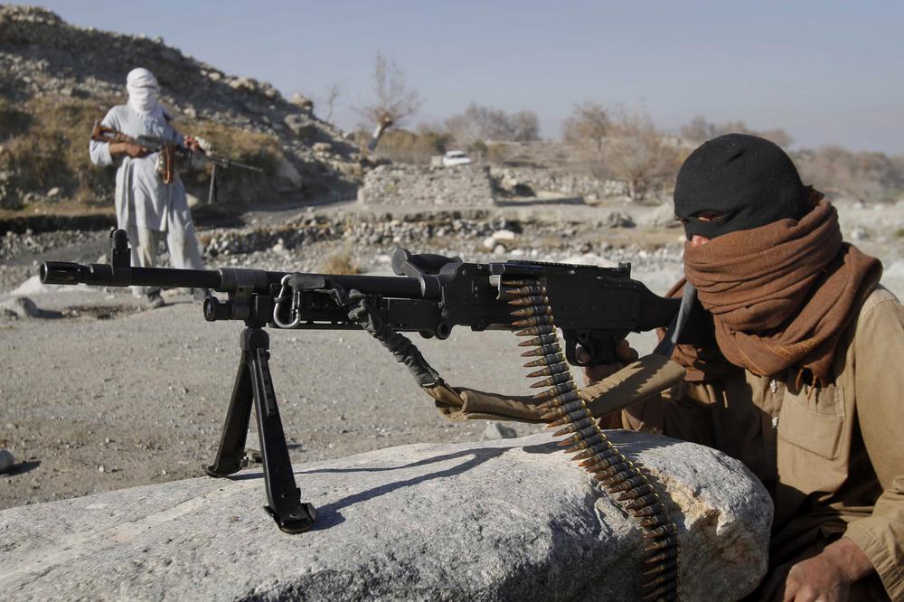 Taliban fighters man a checkpoint in an undisclosed location in Nangarhar province, east of Kabul, Afghanistan. (AP)