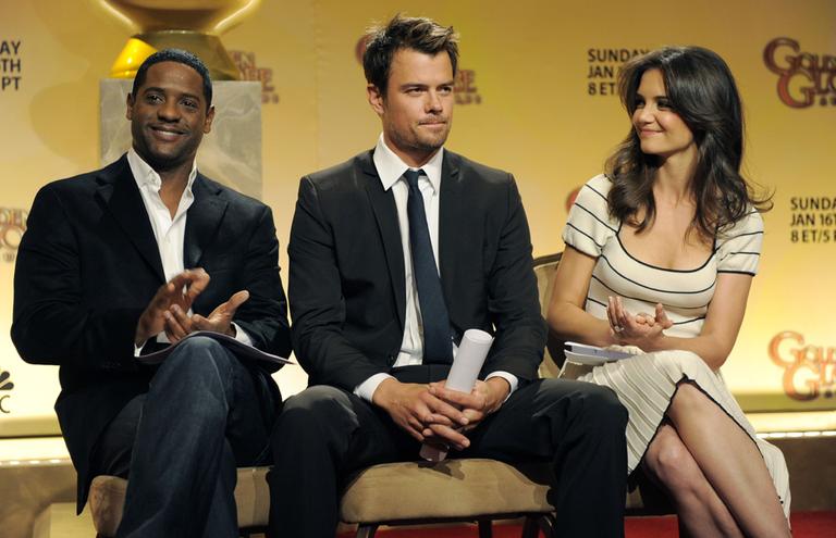 Actors Blair Underwood, left, Josh Duhamel, center, and Katie Holmes prepare to announce nominations for the 68th Annual Golden Globe Awards in Beverly Hills, Calif., Tuesday. (AP)