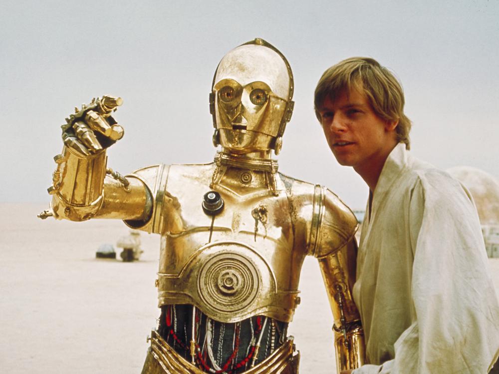 C3PO, the droll droid of Star Wars fame, is shown with the character Luke Skywalker, played by Mark Hamill. (AP/Copyright 2004 Lucasfilm Ltd. &amp; TM. All rights reserved.)