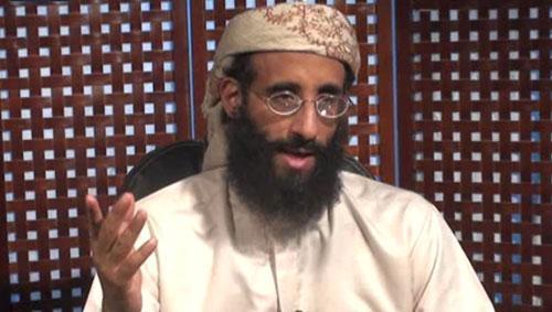 In this image released Monday, Nov. 8, 2010, Anwar al-Awlaki speaks in a video message posted on radical websites. (AP Photo/SITE Intelligence Group)