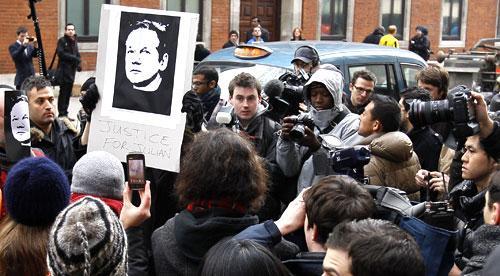 Media and demonstrators in London, Dec. 7, 2010, where WikiLeaks founder Julian Assange was denied bail. (AP)