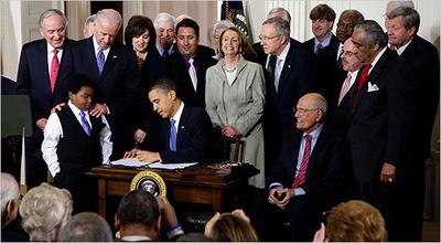 Obama signs national health care reform law