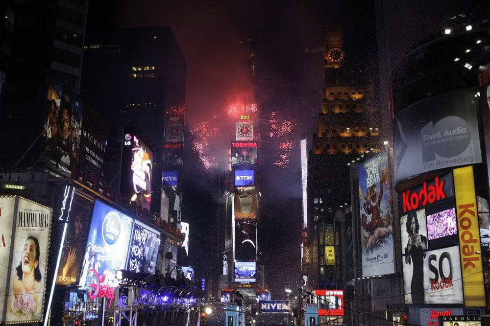 Fireworks erupt from a New York building to signal the 2011 New Year. (AP)