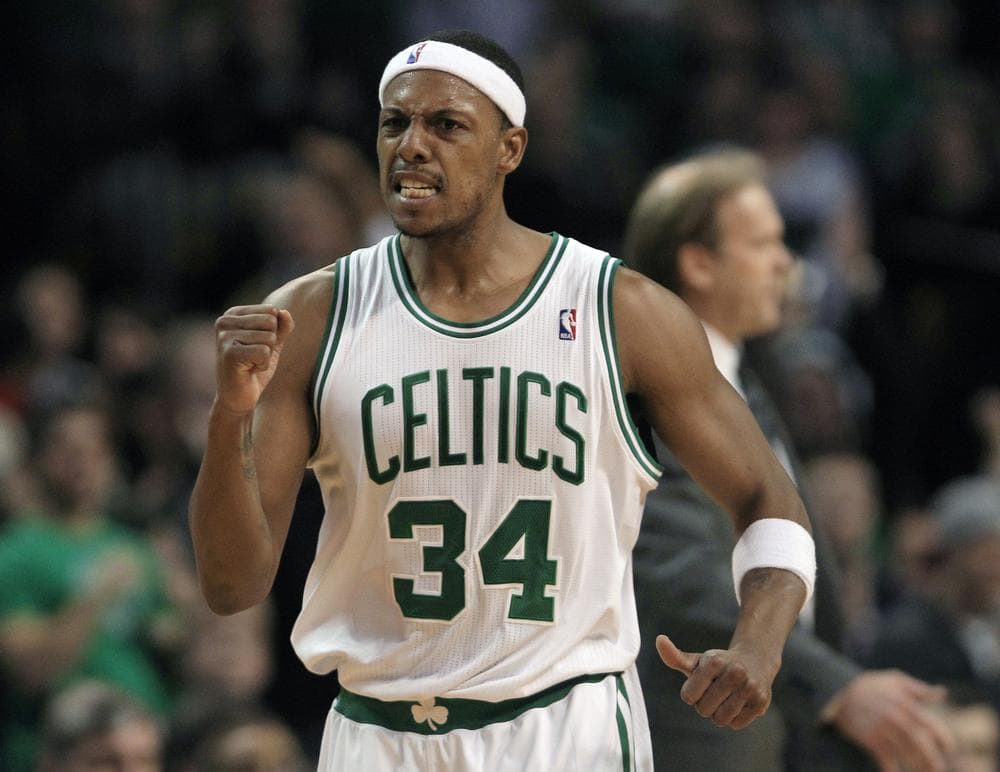 Boston forward Paul Pierce pumps his fist after a basket by teammate Rajon Rondo against Minnesota during the game in Boston on Monday. Pierce had 23 points as the Celtics beat the Timberwolves 96-93. (AP)