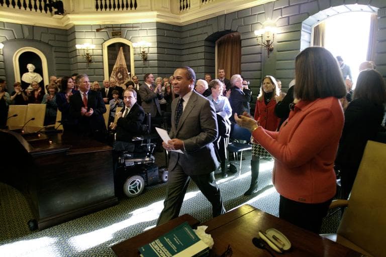 Gov. Deval Patrick arrives at the Senate to swear-in new members at the State House on Wednesday. (AP)