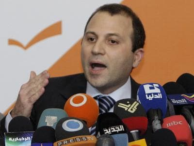 Lebanese Energy Minister Jibran Bassil announces the resignation of Hezbollah ministers and their allies during a press conference in Rabieh, Lebanon, on Wednesday. (AP)