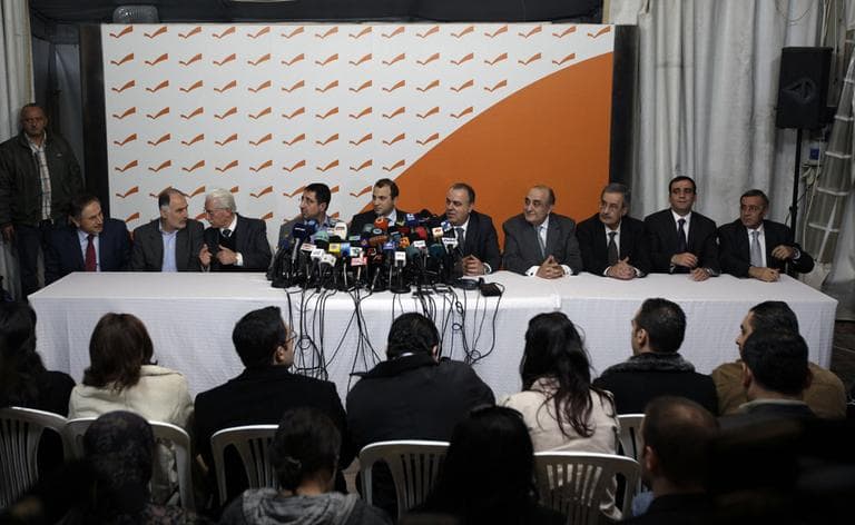 Lebanese Ministers hold a press conference to announce their resignation from the government, January 12, 2011. (AP)