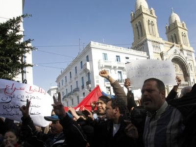 Protesters shouted slogans against former Tunisian President Zine El Abidine Ben Ali during a demonstration Monday in the center of Tunis. (AP)