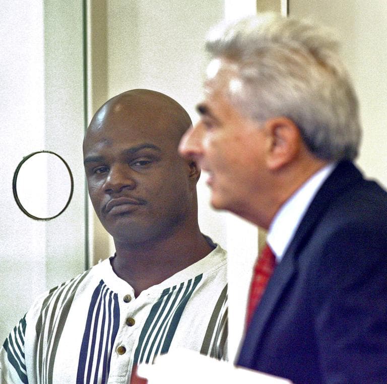 Kimani Washington, left, stands with his lawyer, John Salsberg, in Dorchester Court, on Oct. 13, 2010. (AP)