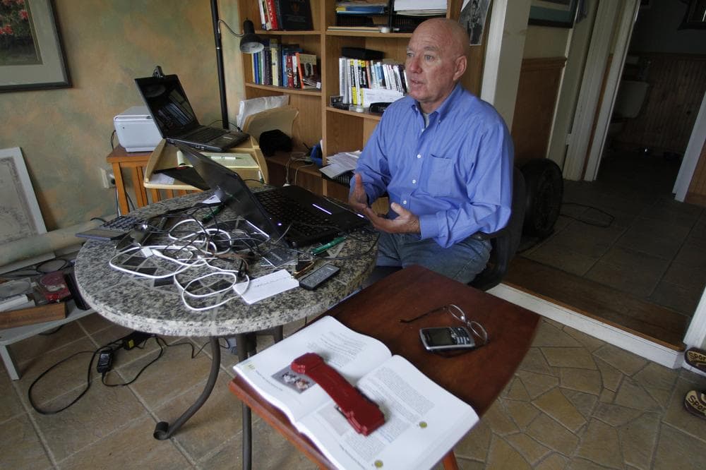 Mike Vanatta sits in his Vero Beach, Fla. home working on one of his blogs. Vanatta was laid off recently from his job as a sales executive. And with savings of just $5,000, he's on a budget for the first time. (AP)