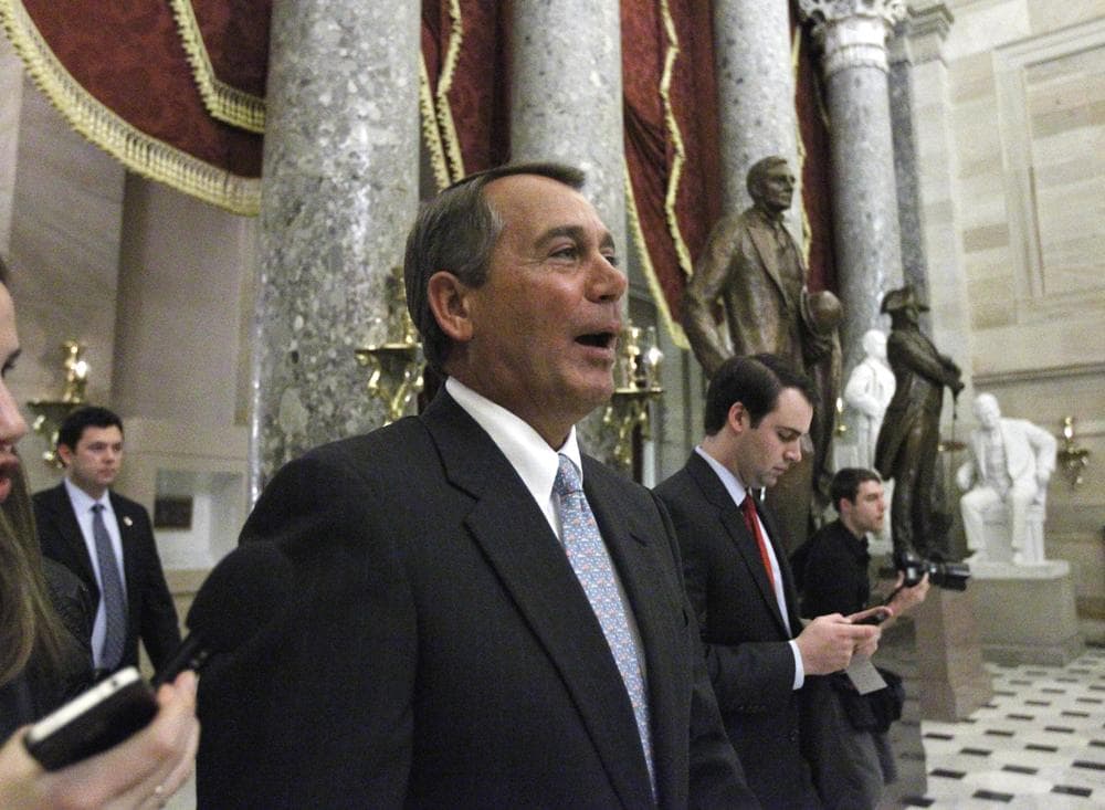 House Speaker John Boehner of Ohio walks through Statuary Hall on Capitol Hill in Washington, after the vote passed to repeal the health care bill. (AP)
