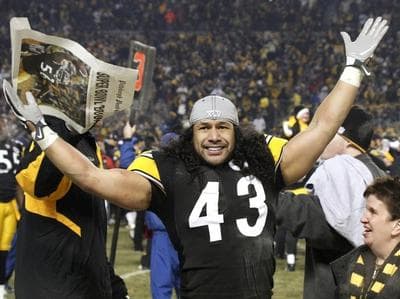 Pittsburgh Steelers safety Troy Polamalu celebrates after a 24-19 win over the New York Jets in the AFC championship game in Pittsburgh Sunday. (AP)