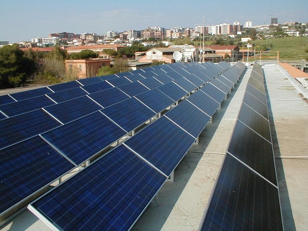 Evergreen solar panels installed on technical high school near Rome. (PRNewsFoto/Evergreen Solar, Inc.)