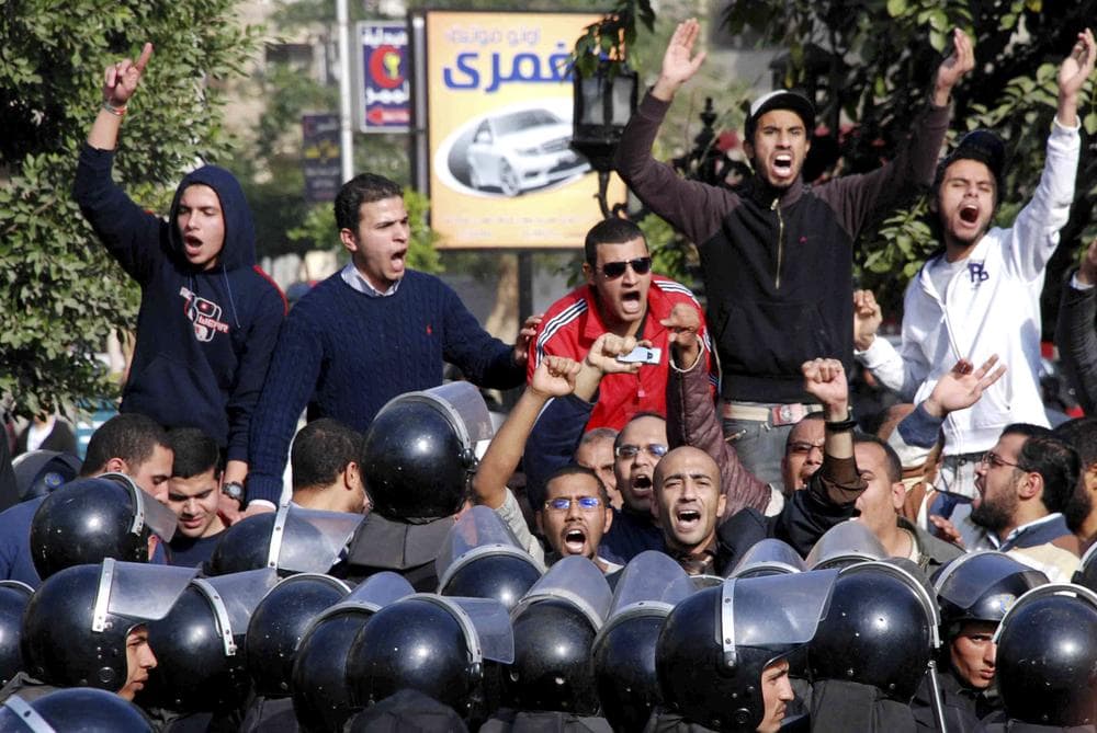 Angry Egyptian protesters shout anti-government slogans during a protest in Suez, Egypt. Egyptian activists protested for a third day as social networking sites called for a mass rally in the capital Cairo after Friday prayers. (AP)