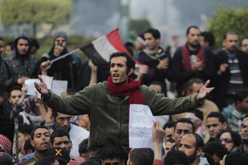 Egyptian anti-government protesters chant slogans as they gather in Tahrir square in Cairo, Egypt, Saturday, Jan. 29, 2011.  Mobile phone service have been partially restored in Egypt, Saturday, after the recent communications blackout. (AP Photo/Lefteris Pitarakis)