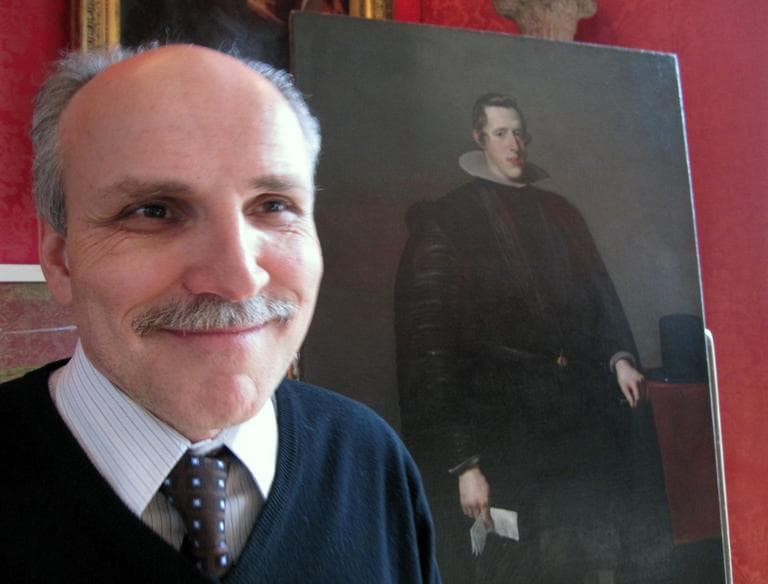 Gianfranco Pocobene, the head of conservation at the Gardner, with the restored Velazquez. (Andrea Shea/WBUR)
