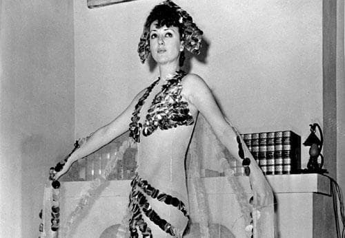 Gypsy Rose Lee, whose real name was Louise Hovick, shows off her costume, called &#039;Eclipse of the Sun.’ (AP)