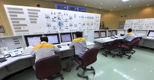 Iranian technicians work at the Bushehr nuclear power plant in Iran, Nov. 23, 2010 (AP)