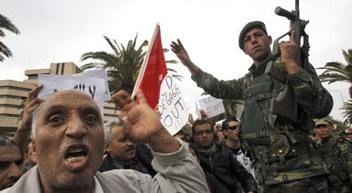 Protestors shout slogans, in Tunisia, Thursday, Jan. 20. 2011. (AP)