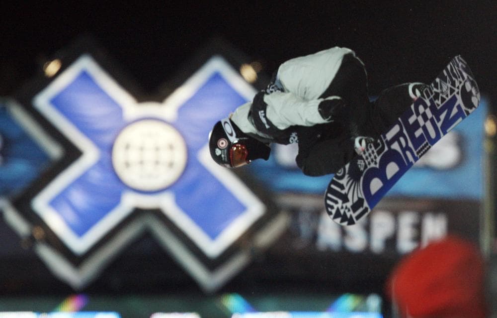 Shaun White on his way to winning the snowboard superpipe at the 2010 Winter X Games. (AP)