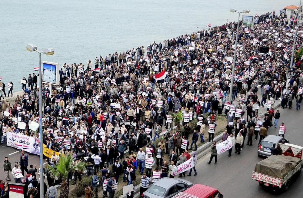 Egyptians shout anti-Mubarak slogans during a march on Alexandria's Mediterranean Sea bank, Egypt, Thursday. (AP)